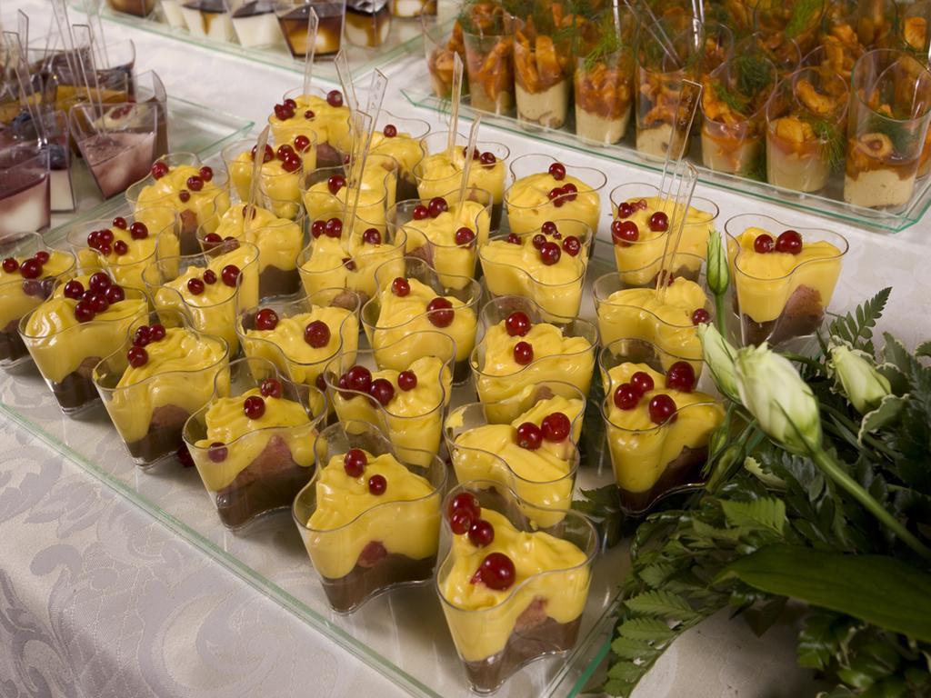 Hotel Vittoria Pesaro Exterior photo A selection of desserts